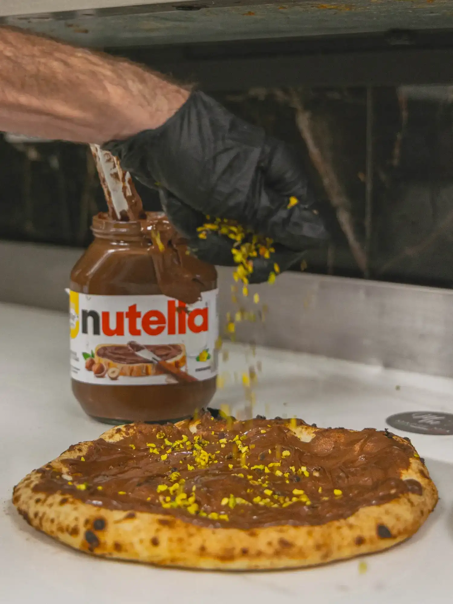 Pizza Nutella aux éclats de pistache